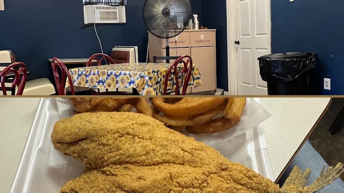 Catfish and sides served on white plates.