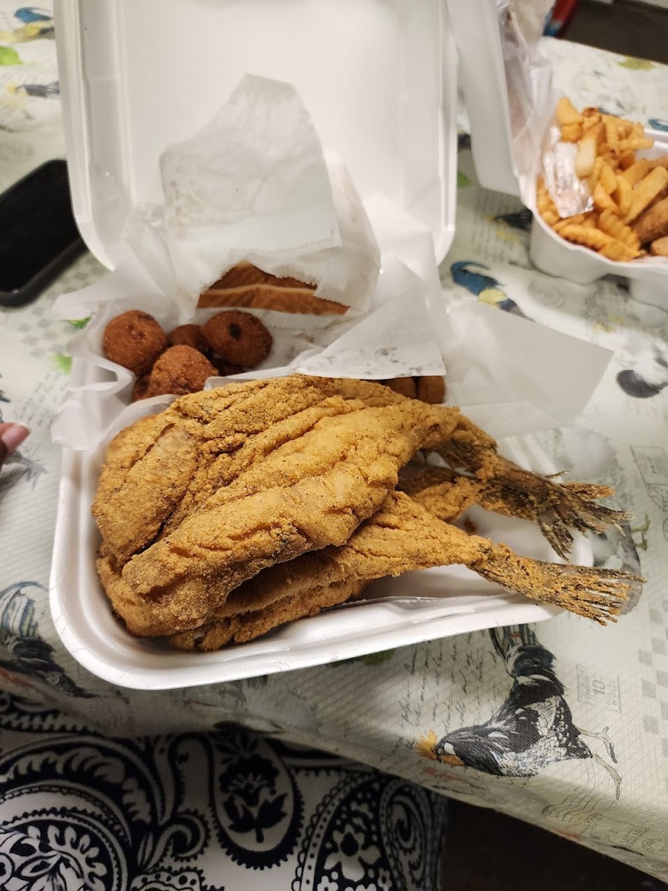 Restaurant menu showing pantrout and burgers.